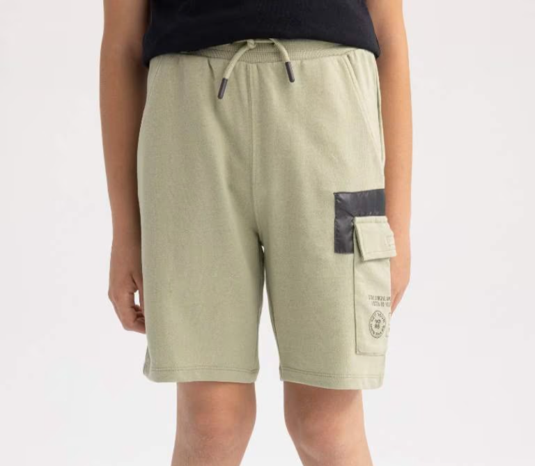 [A4133A8KH271] شورت اولادي قماش  (5 - 6 year)